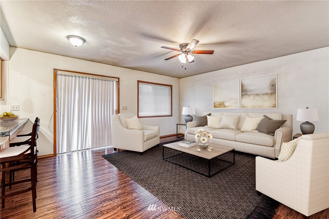 18212 Empire Street Southwest Rochester, WA 98579 - Photo 10 of 29 a living room with furniture or couch and a window