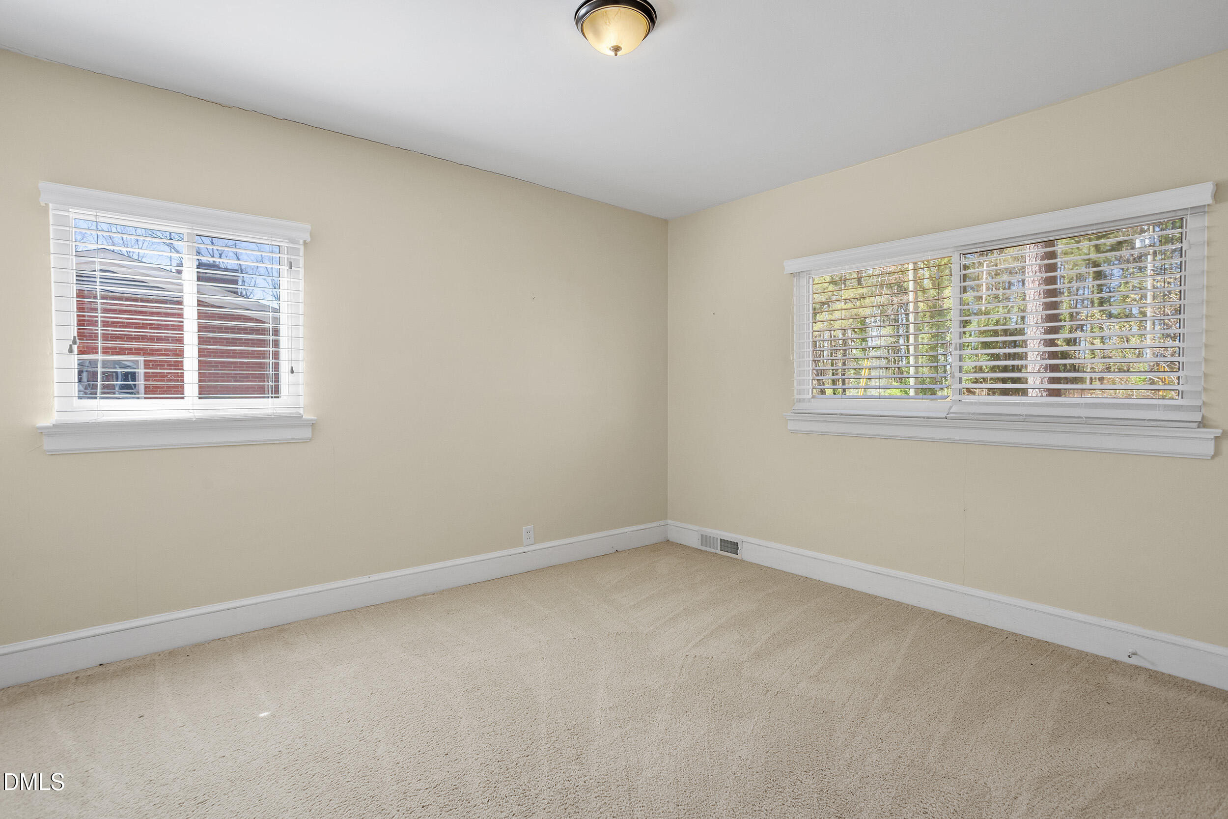 5011 Old Stage Road Raleigh, NC 27603 - Photo 21 of 29 a view of an empty room with a window