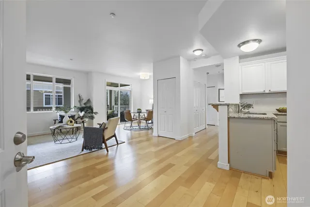 a living room with furniture and a table