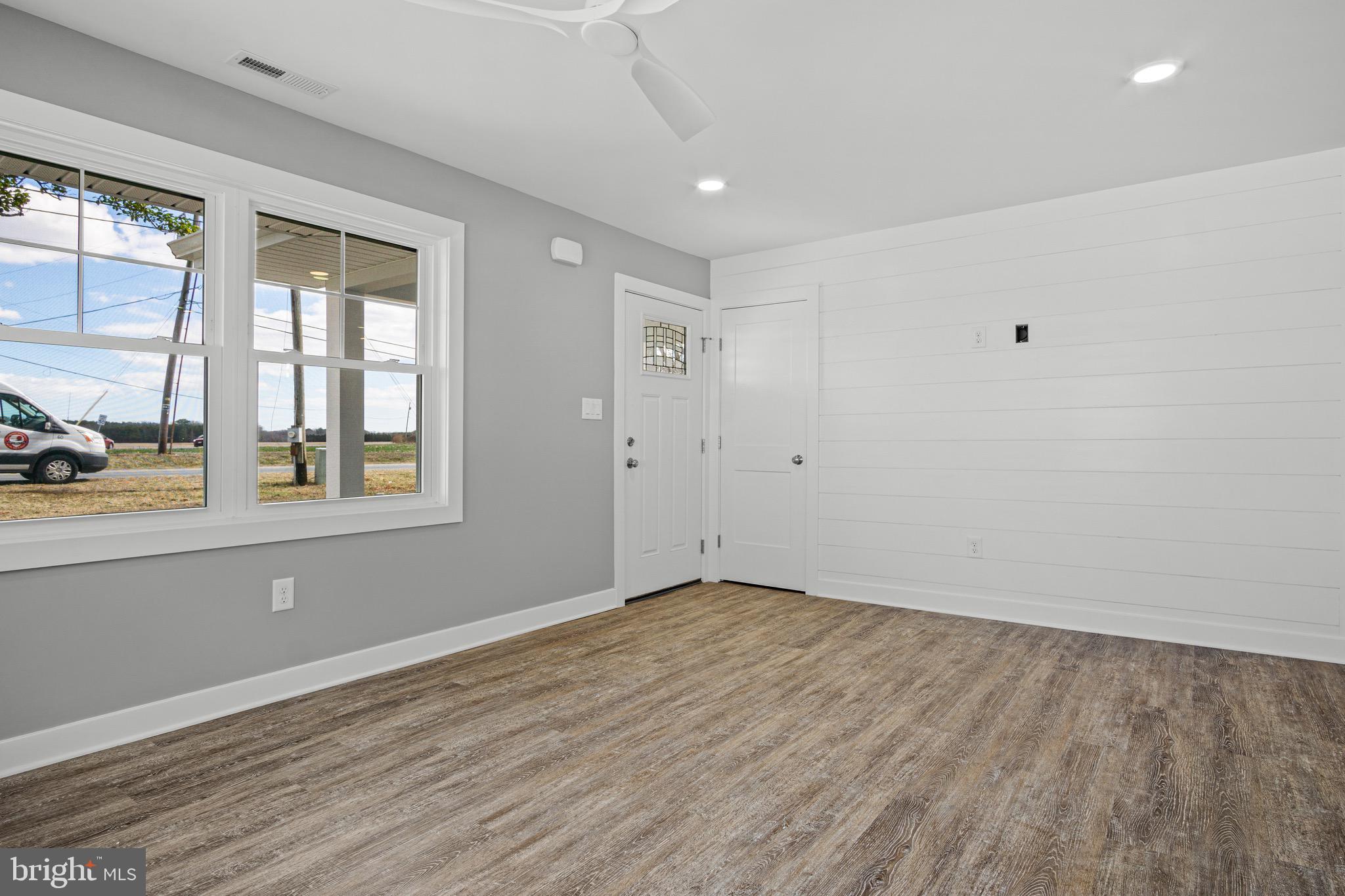 34648 Pepper Road Frankford, DE 19945 - Photo 10 of 38 Living room with shiplap wall