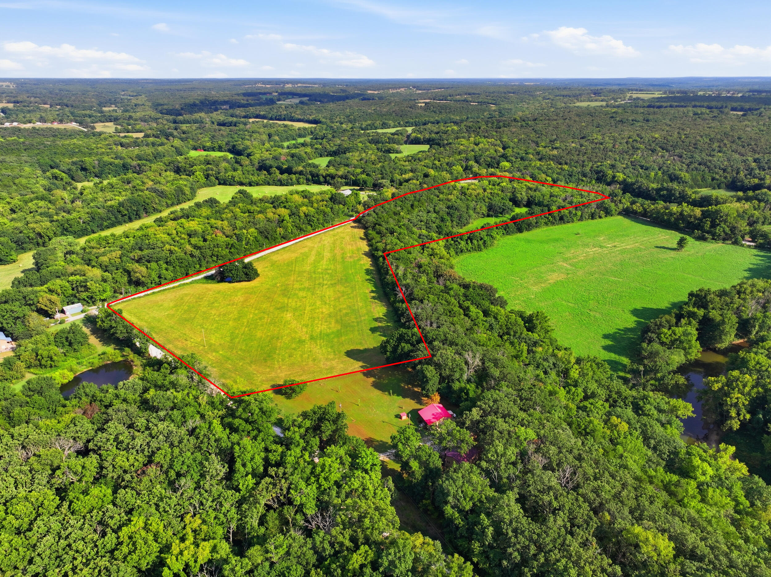 3207 South 205th Road Half Way, MO 65663 - Photo 4 of 46 dji_20260806024523_0284_d-edit