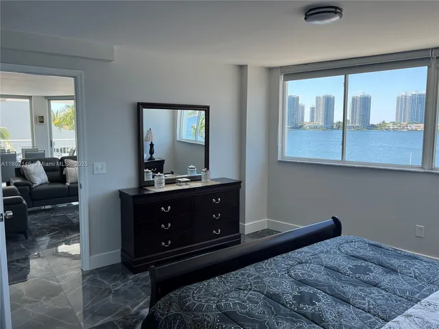 a kitchen with a sink a refrigerator freezer a washer and dryer