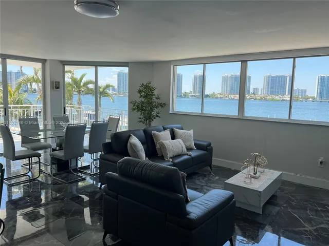 a kitchen with a refrigerator stove and microwave