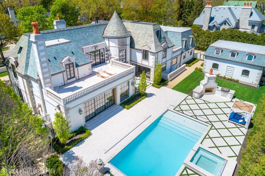 a view of multiple houses with yard