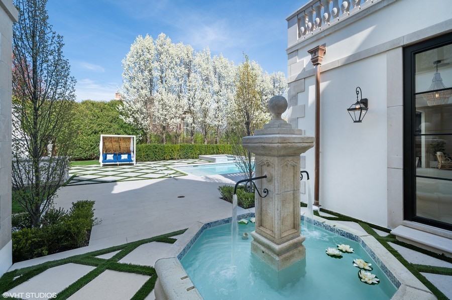 655 Sheridan Road Glencoe, IL 60022 - Photo 11 of 45 a house view with a sitting space fire pit and outdoor space