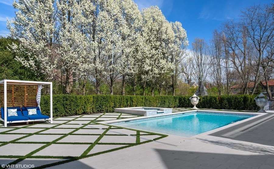 655 Sheridan Road Glencoe, IL 60022 - Photo 12 of 45 a view of a swimming pool with a patio