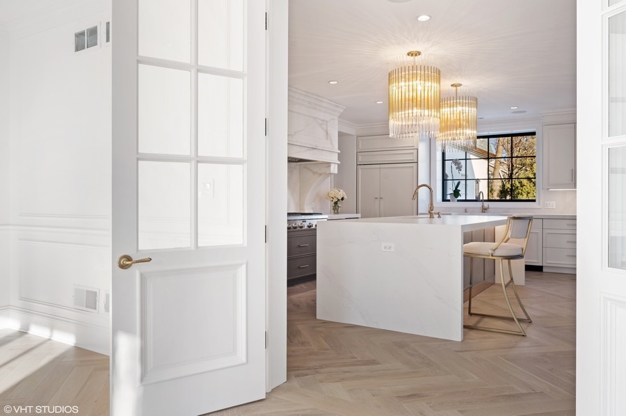 655 Sheridan Road Glencoe, IL 60022 - Photo 14 of 45 a room with a sink a washer and dryer