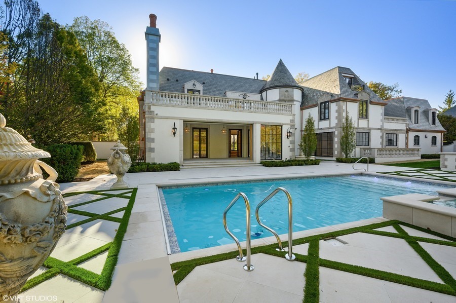 655 Sheridan Road Glencoe, IL 60022 - Photo 39 of 45 a view of a patio with table and chairs with wooden floor and fence