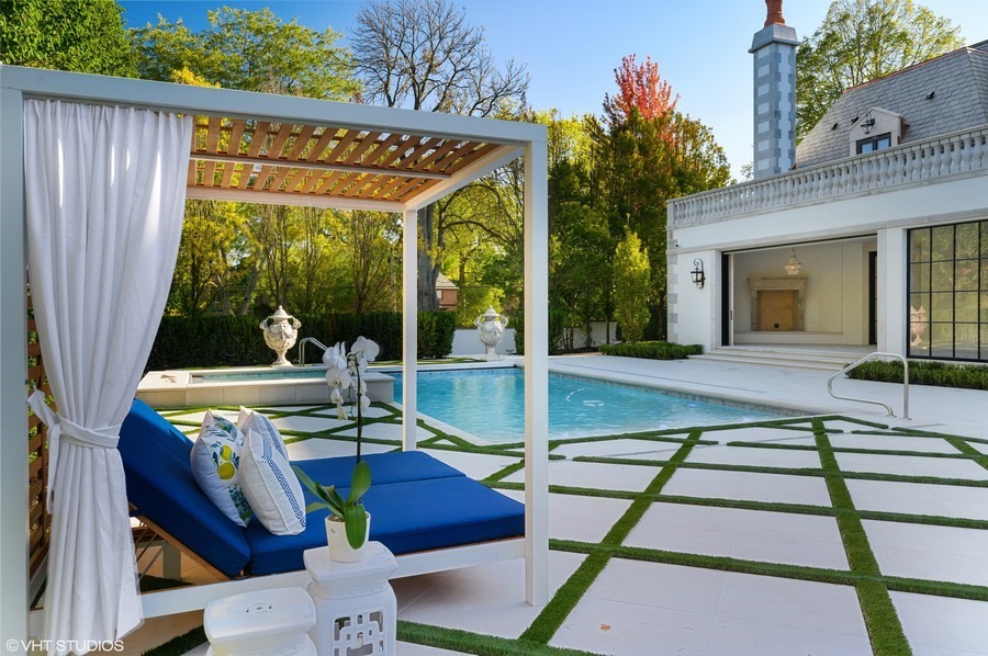 655 Sheridan Road Glencoe, IL 60022 - Photo 41 of 45 a view of a patio with table and chairs and potted plants