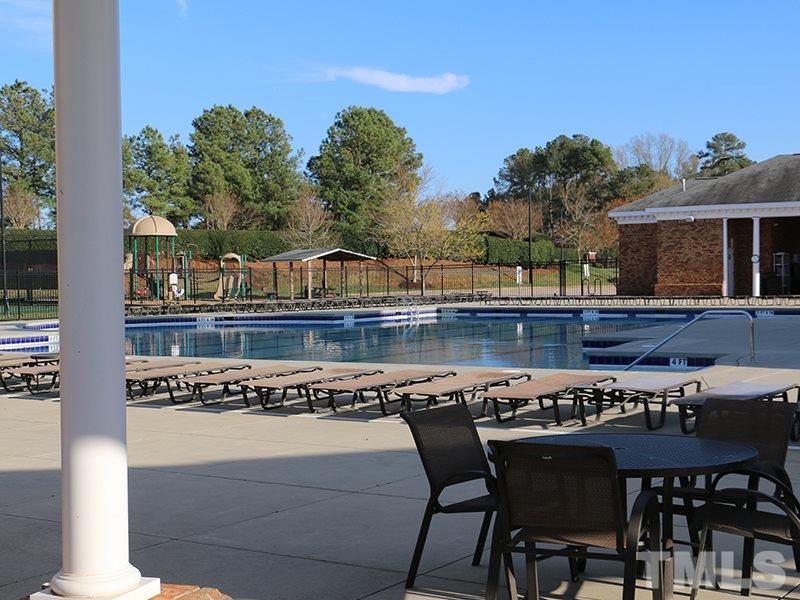 1045 Ileagnes Road Raleigh, NC 27603 - Photo 20 of 22 a view of a chairs and table on the terrace