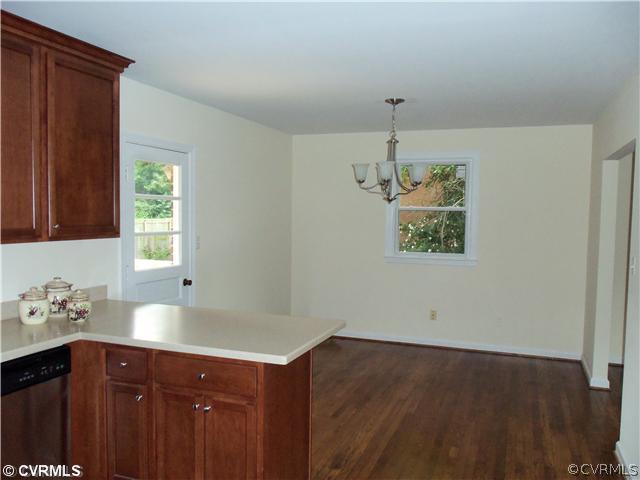 1209 Covington Road Colonial Heights, VA 23834 - Photo 5 of 12 a kitchen with a sink and a window