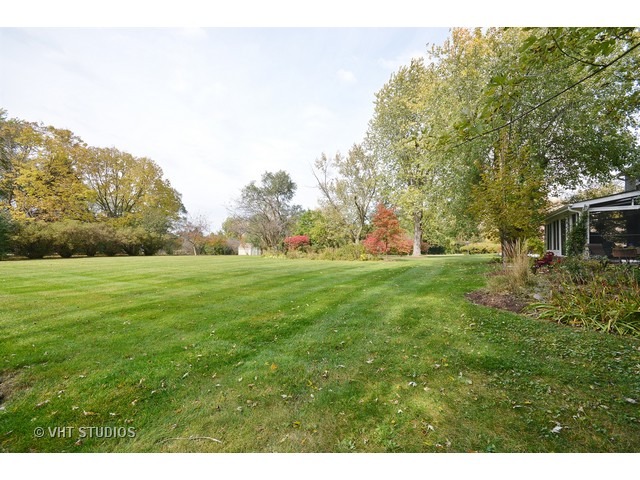 5N316 Oak Road St. Charles, IL 60175 - Photo 22 of 25 a backyard of a house with lots of green space