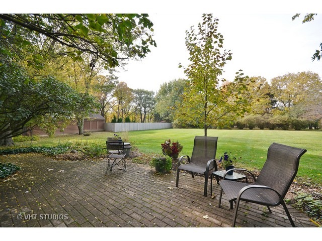 5N316 Oak Road St. Charles, IL 60175 - Photo 23 of 25 a view of a lake with furniture and garden