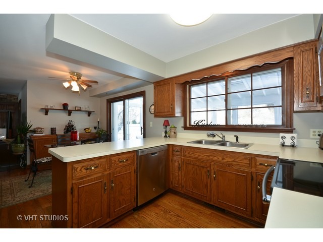 5N316 Oak Road St. Charles, IL 60175 - Photo 6 of 25 a kitchen with lots of counter space and a sink
