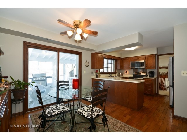 5N316 Oak Road St. Charles, IL 60175 - Photo 8 of 25 a view of a dining room with furniture window and outside view