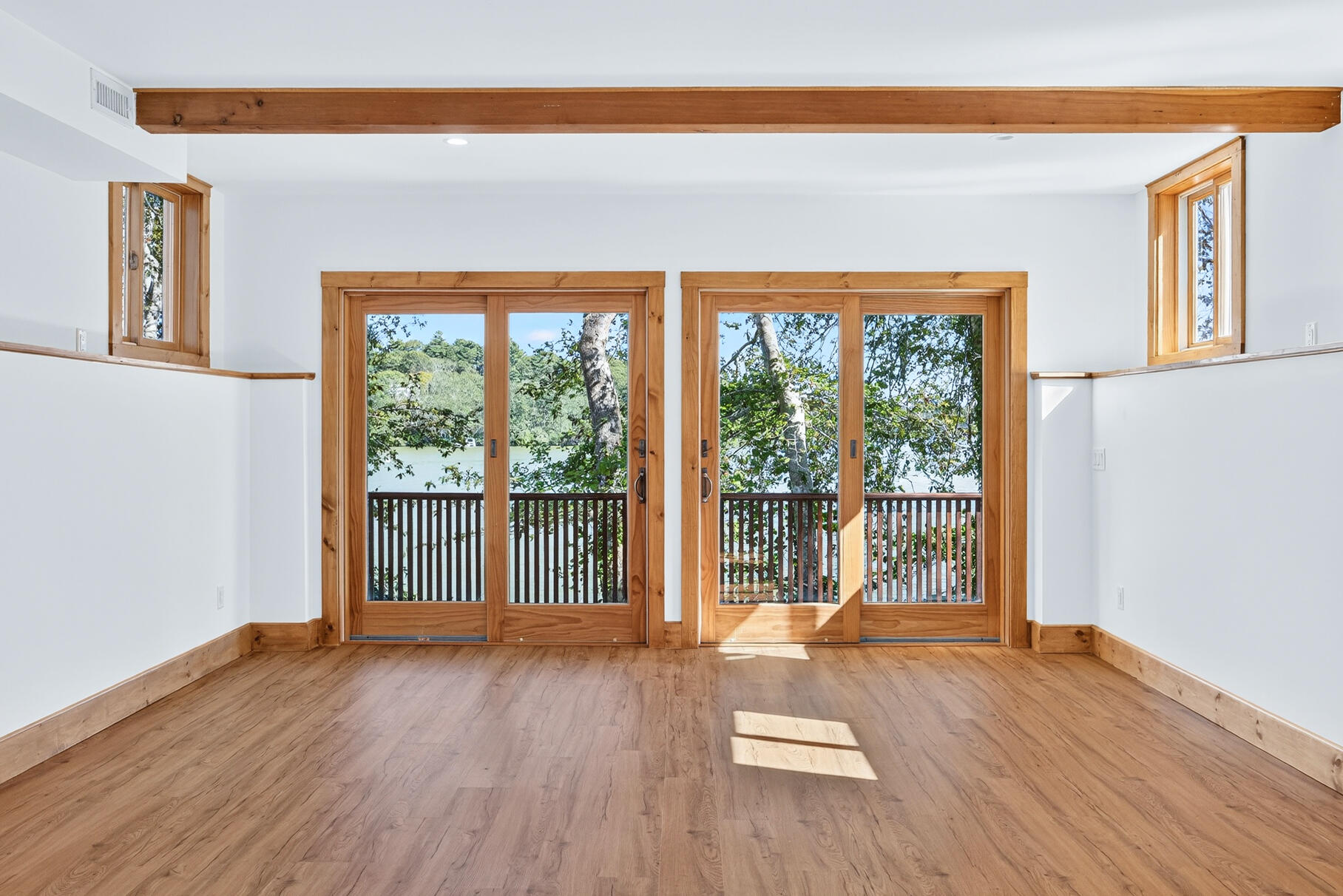 131 Timberlane Drive Mashpee, MA 02649 - Photo 42 of 57 a view of empty room with wooden floor and fan