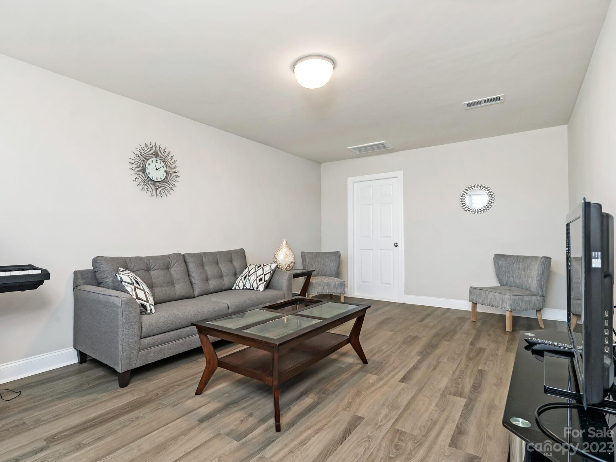 3324 Sincerity Road Monroe, NC 28110 - Photo 16 of 24 a living room with furniture
