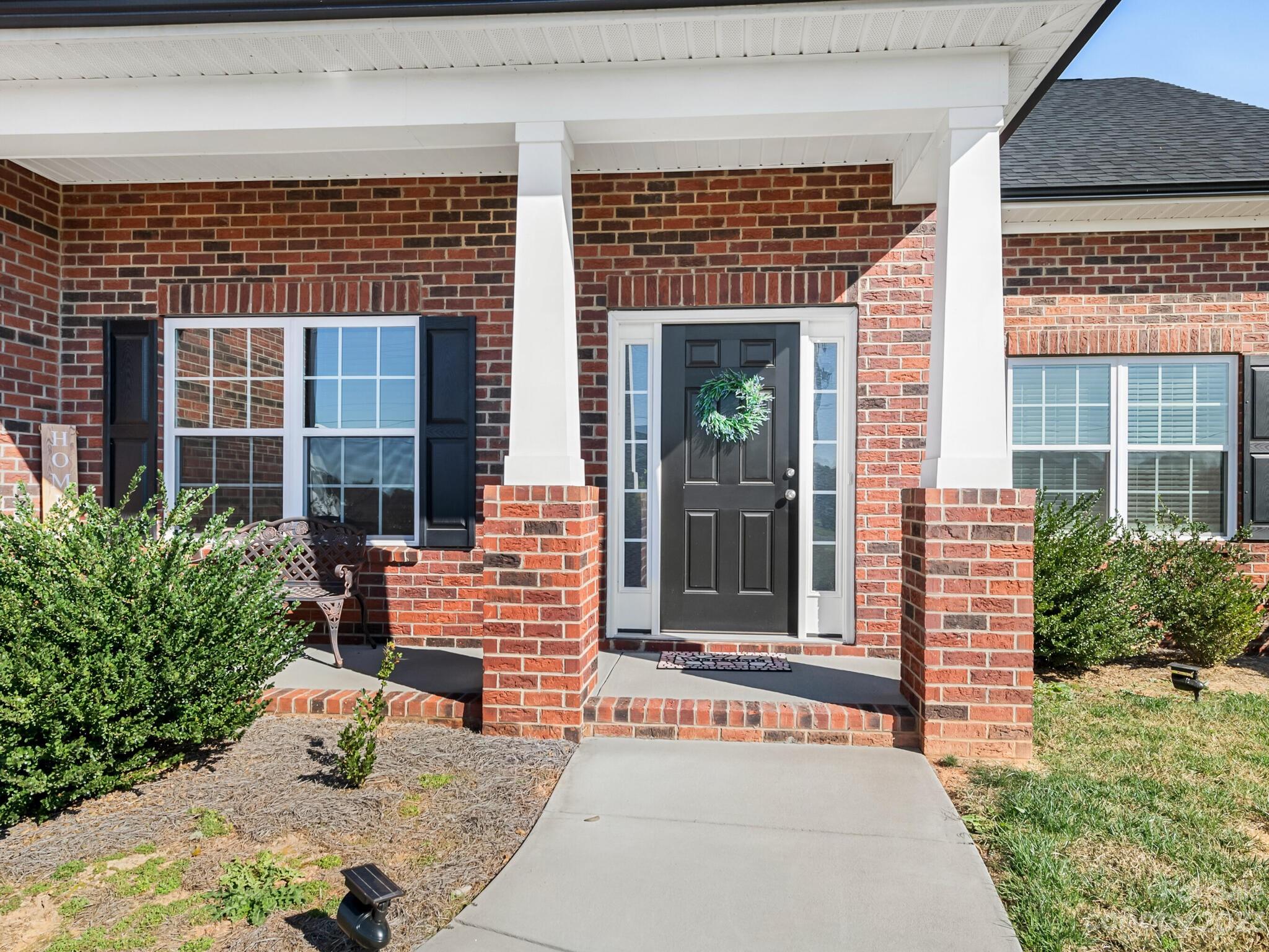 3324 Sincerity Road Monroe, NC 28110 - Photo 2 of 24 a front view of a house with a yard