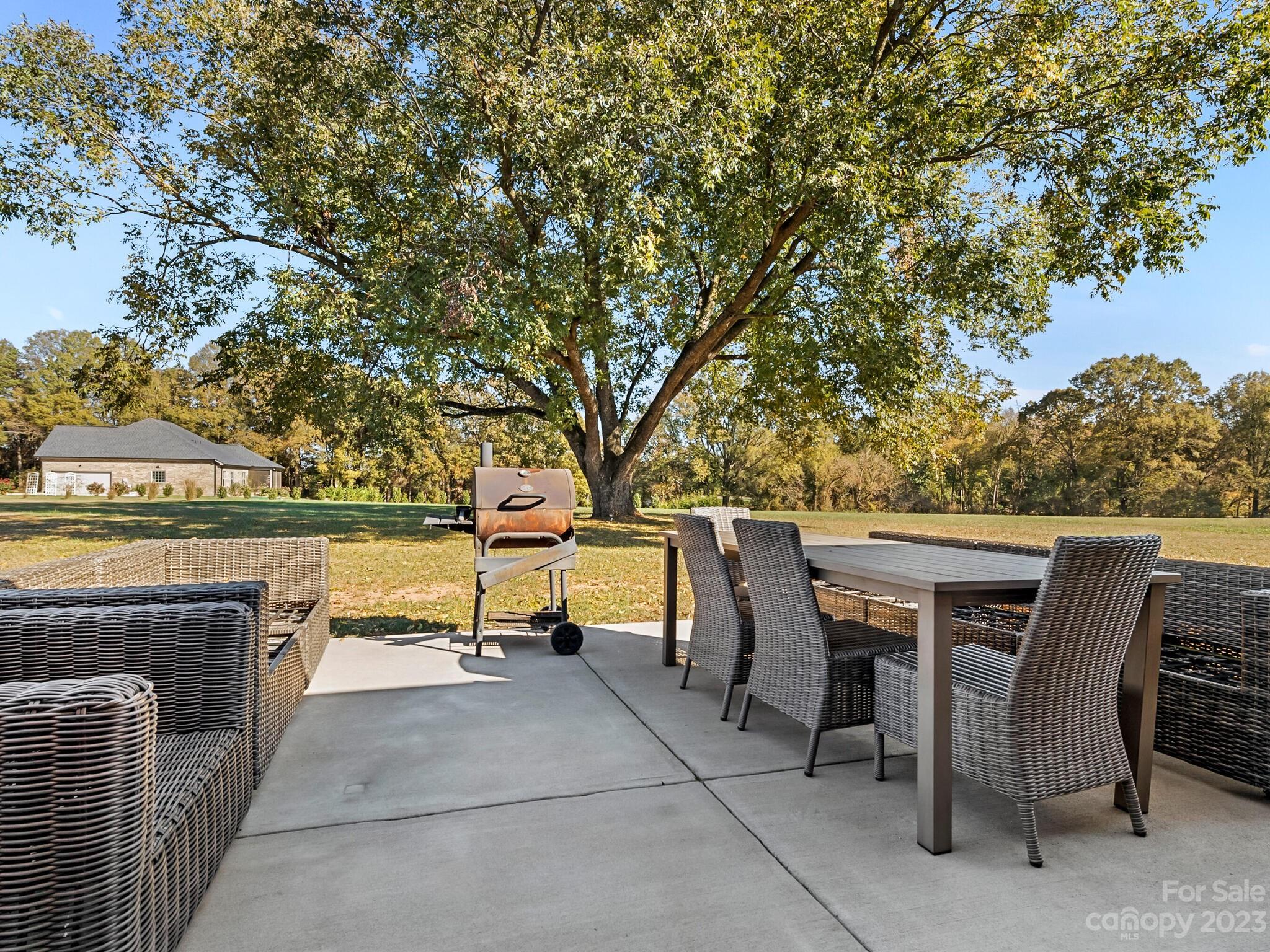 3324 Sincerity Road Monroe, NC 28110 - Photo 21 of 24 a view of backyard with seating and green space
