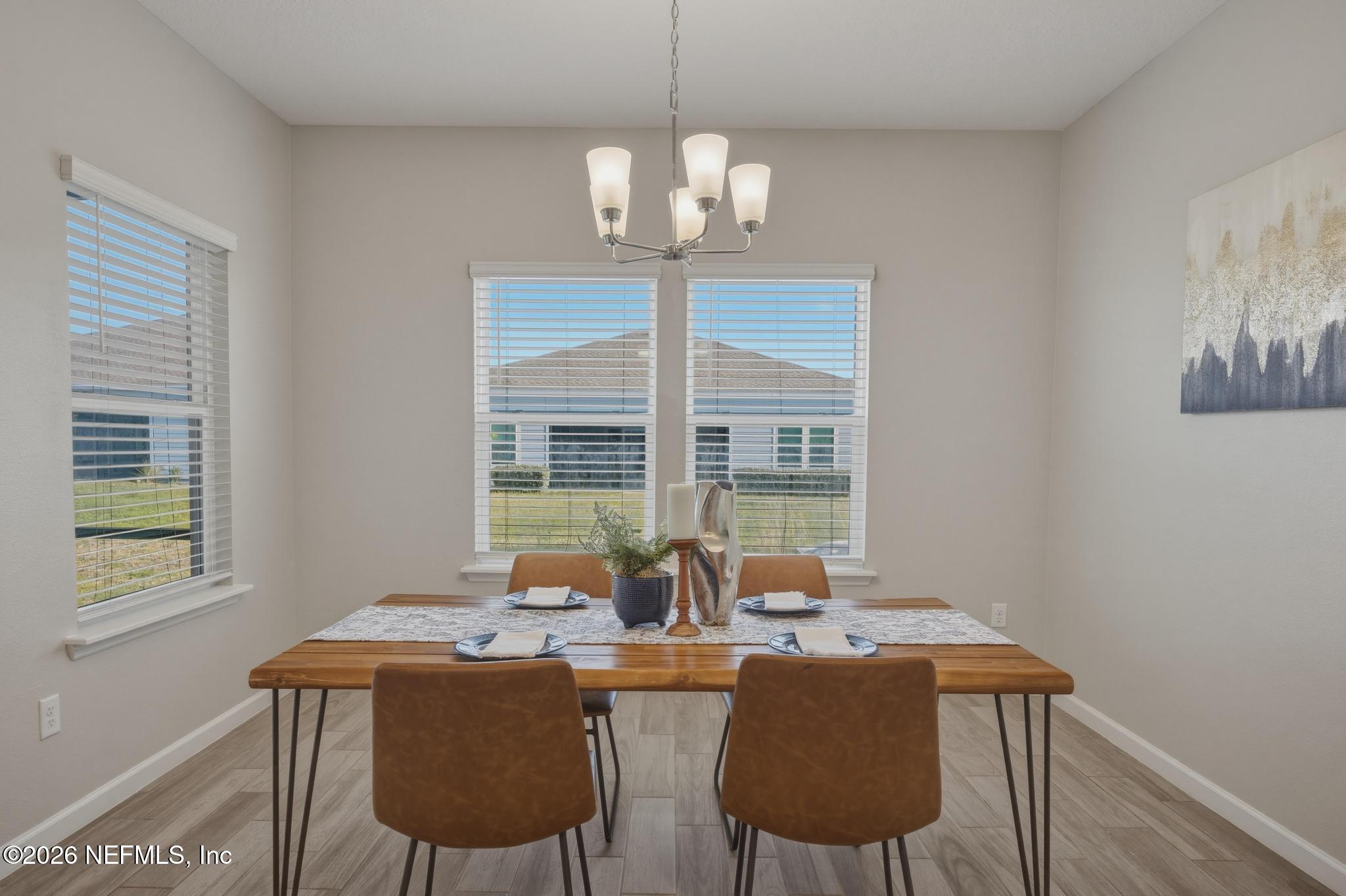 3841 Heatherbrook Place Middleburg, FL 32068 - Photo 16 of 39 a view of a dining room with furniture window and outside view