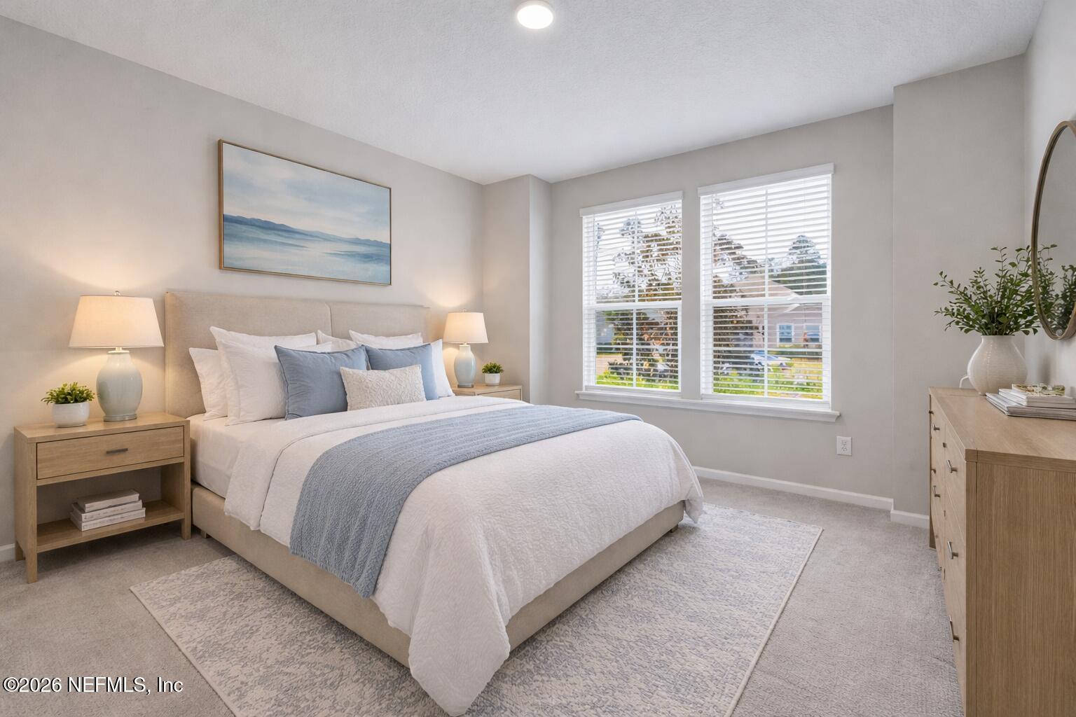3841 Heatherbrook Place Middleburg, FL 32068 - Photo 21 of 39 a bedroom with a large bed and a window