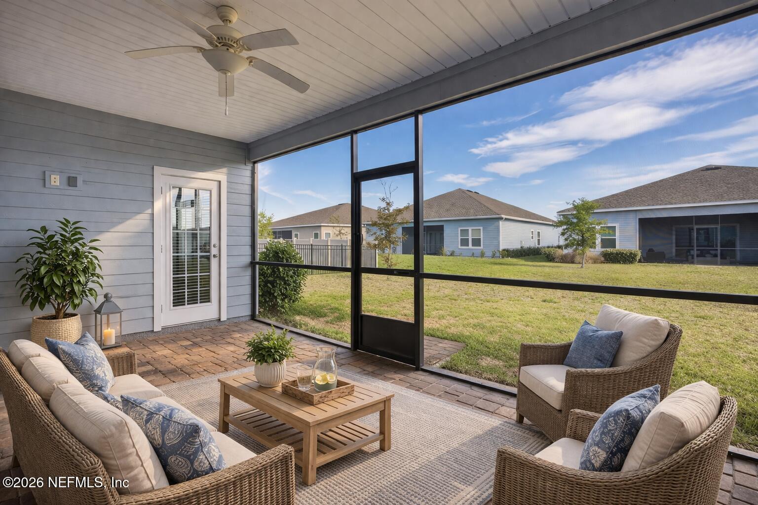 3841 Heatherbrook Place Middleburg, FL 32068 - Photo 29 of 39 a living room with furniture and a large window