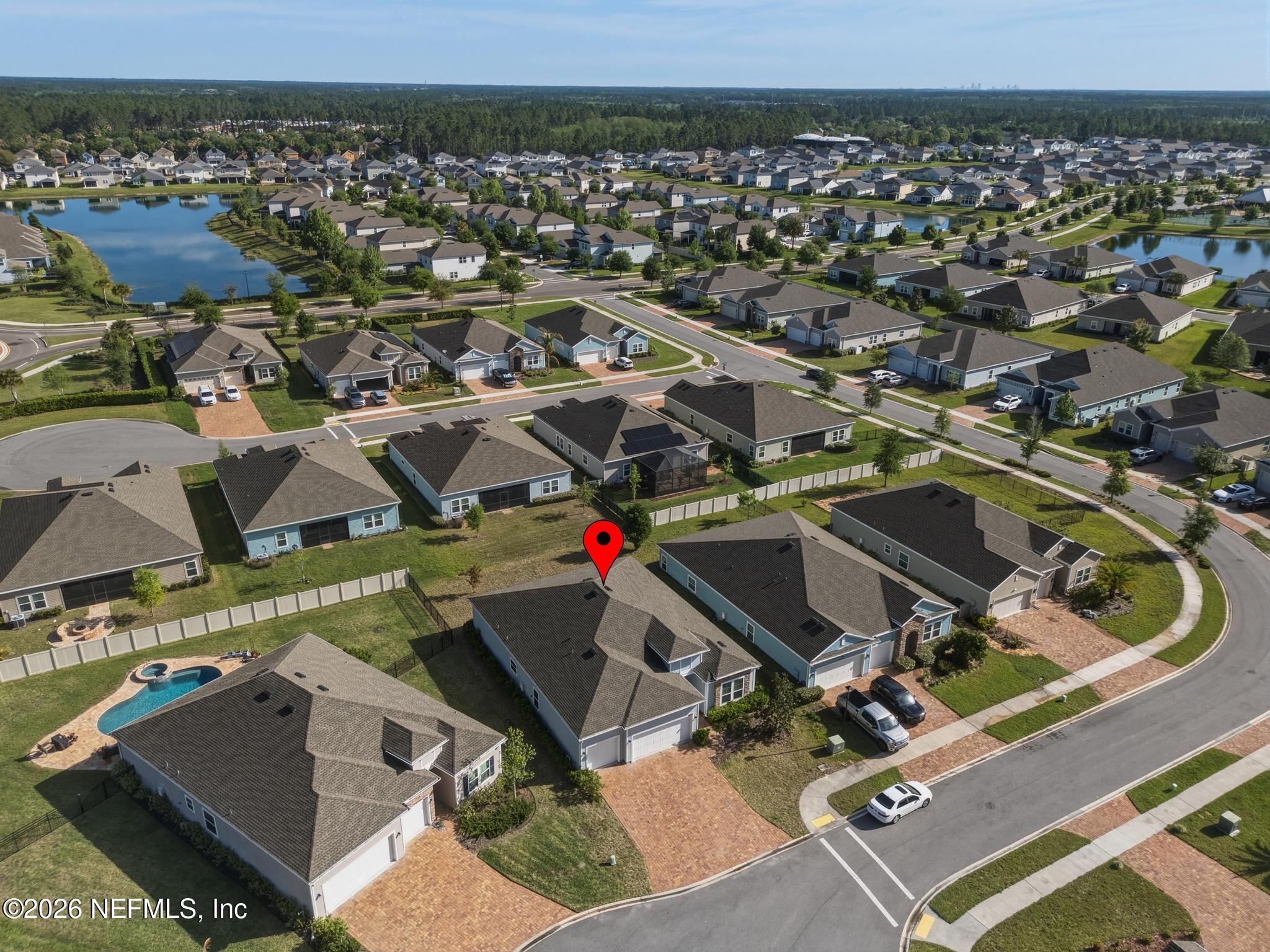 3841 Heatherbrook Place Middleburg, FL 32068 - Photo 34 of 39 an aerial view of a house with a mountain