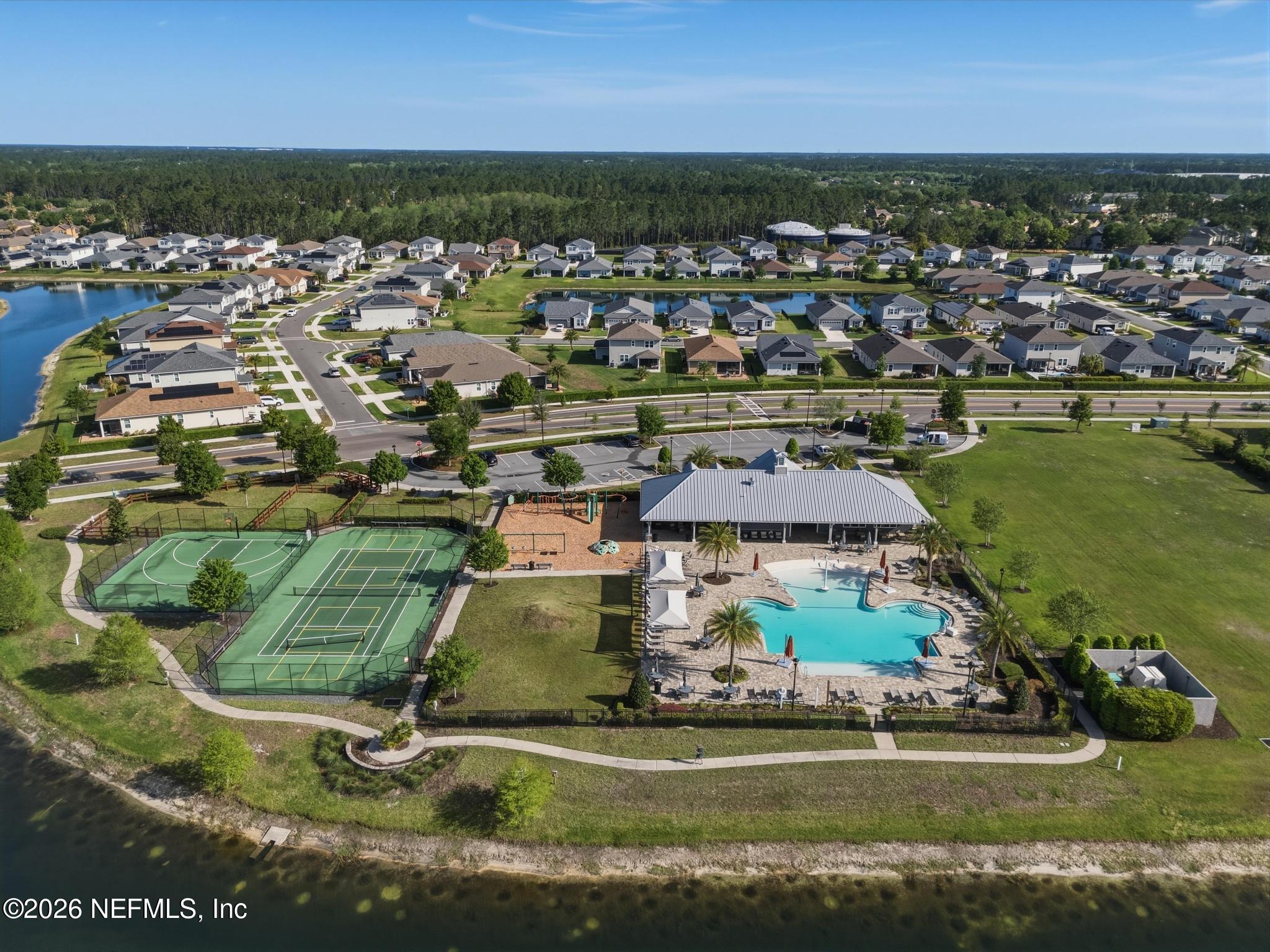 3841 Heatherbrook Place Middleburg, FL 32068 - Photo 36 of 39 an aerial view of residential houses with outdoor space