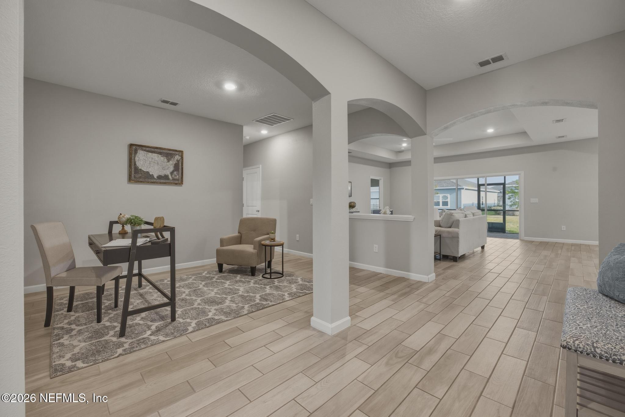 3841 Heatherbrook Place Middleburg, FL 32068 - Photo 4 of 39 a view of kitchen with furniture and wooden floor