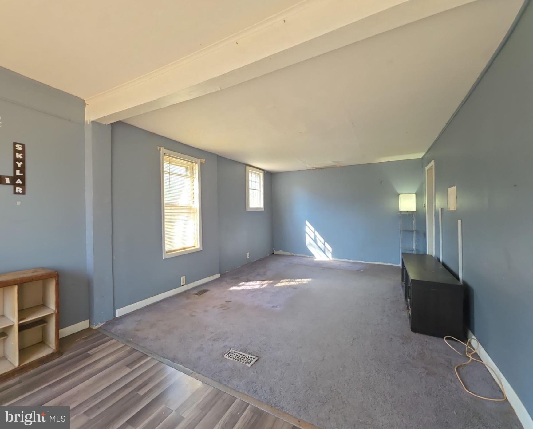 44 Highland Avenue Clementon, NJ 08021 - Photo 14 of 37 a view of empty room with wooden floor and fan
