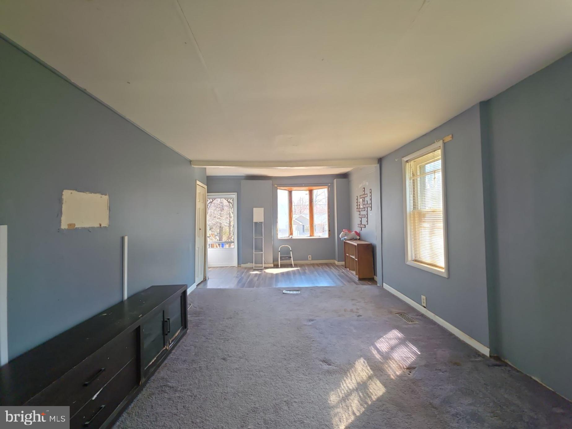 44 Highland Avenue Clementon, NJ 08021 - Photo 15 of 37 a living room with furniture and a window