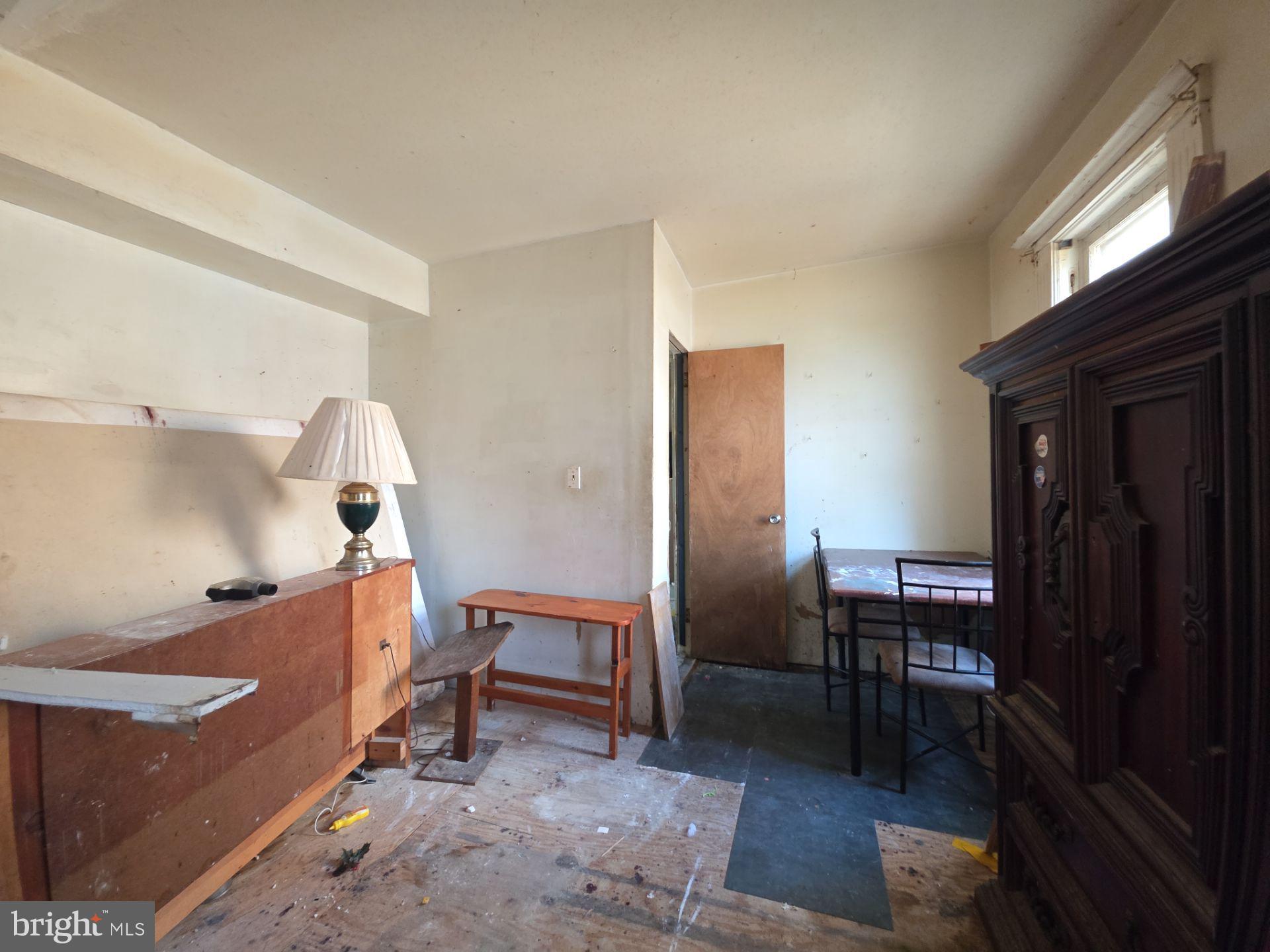 44 Highland Avenue Clementon, NJ 08021 - Photo 18 of 37 a room with furniture and a window