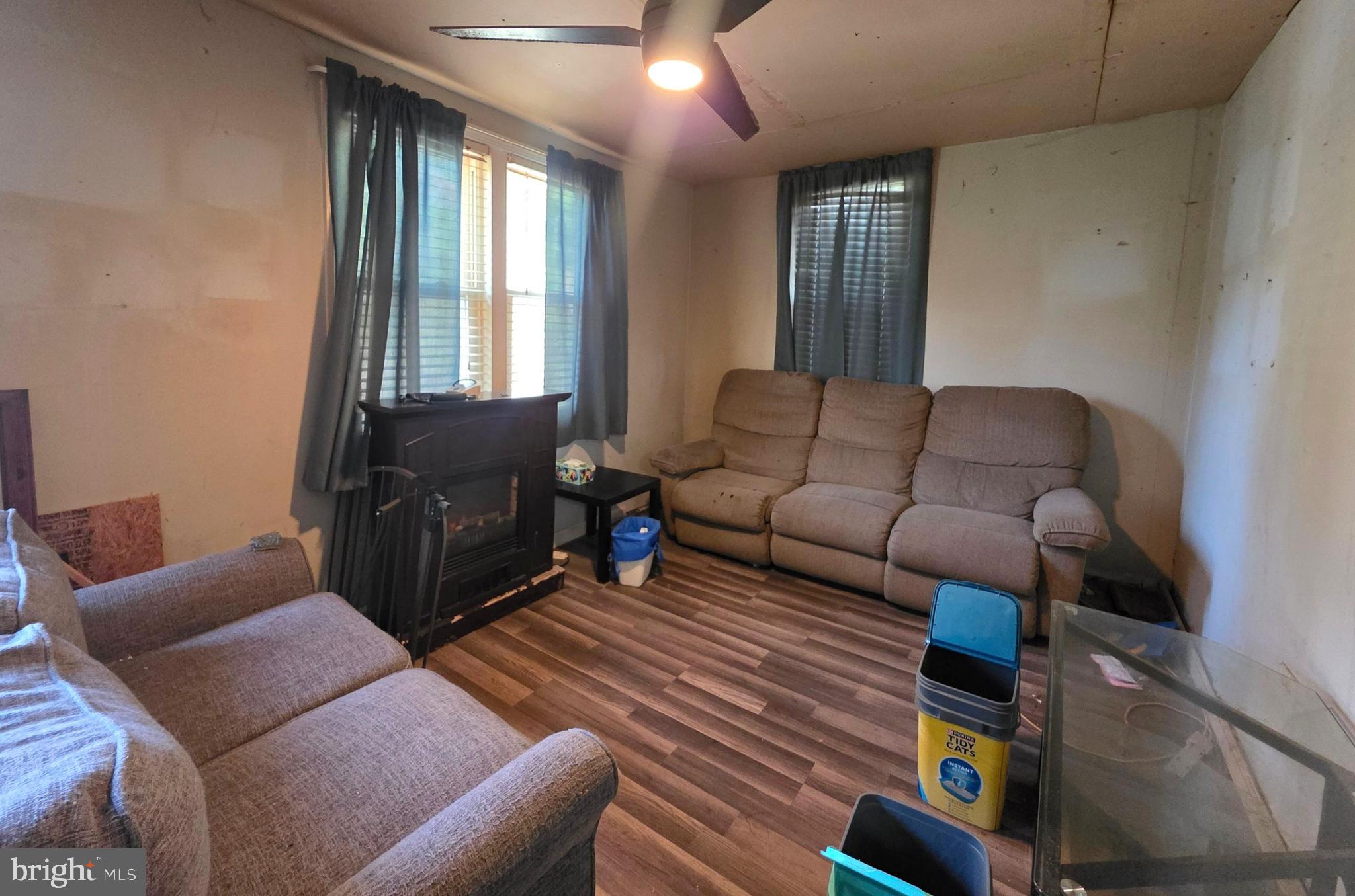 44 Highland Avenue Clementon, NJ 08021 - Photo 25 of 37 a living room with furniture and a window