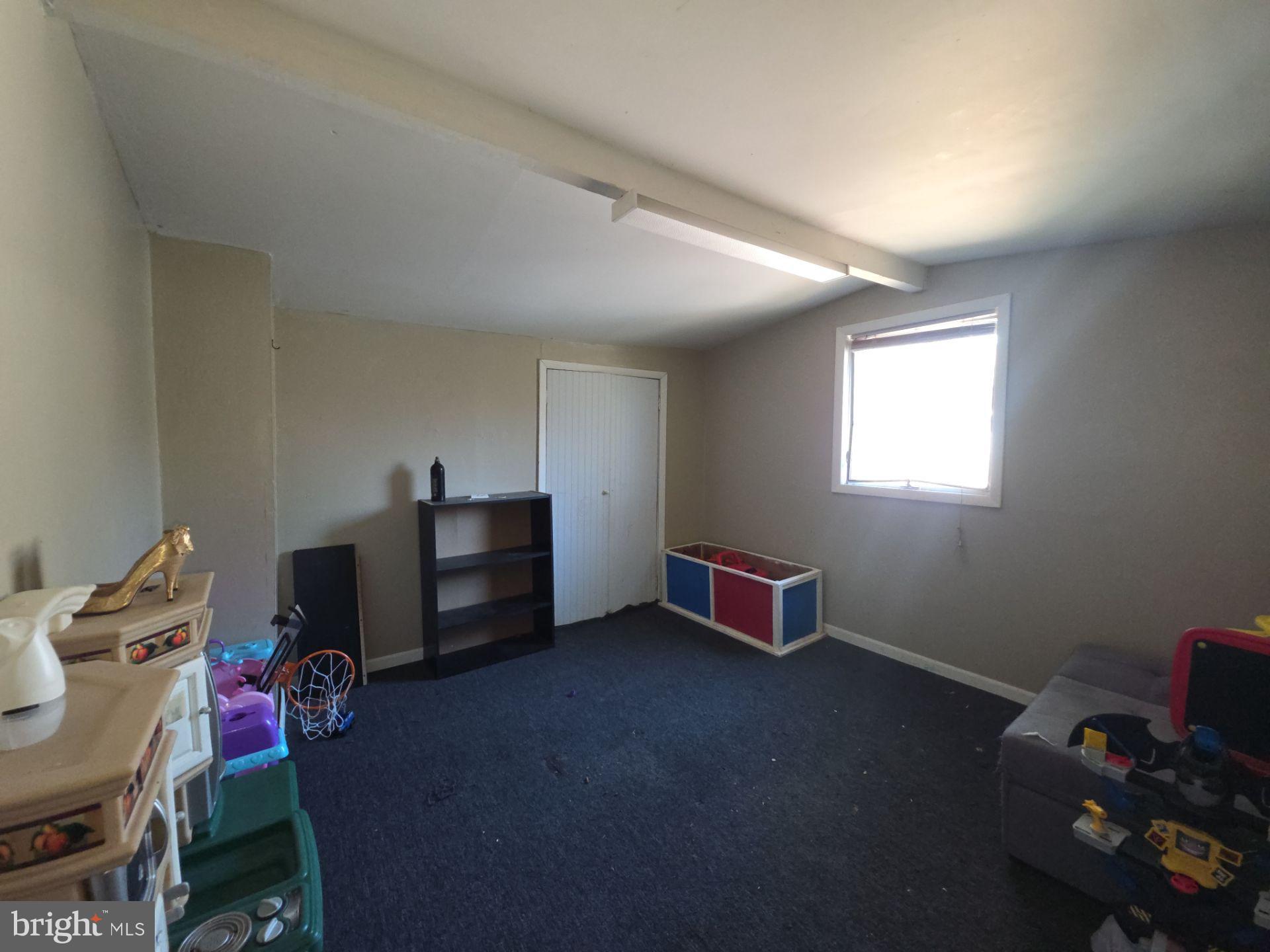 44 Highland Avenue Clementon, NJ 08021 - Photo 36 of 37 a room with furniture and window