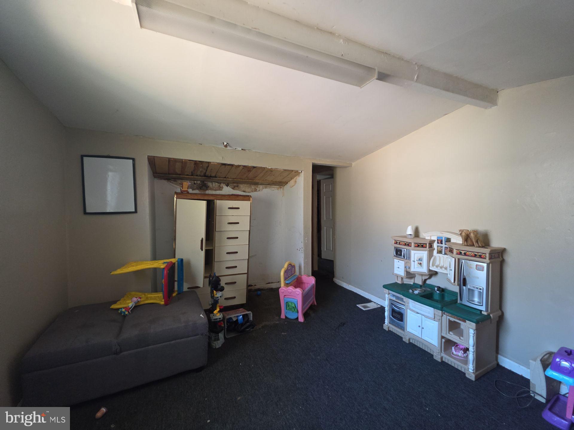 44 Highland Avenue Clementon, NJ 08021 - Photo 37 of 37 a living room with furniture and a couch