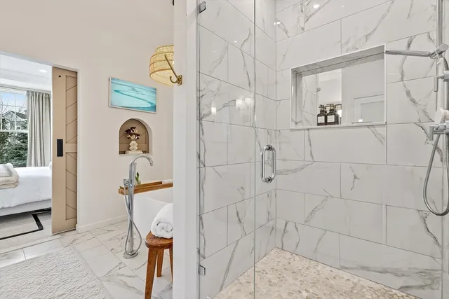 a view of a workspace with furniture and wooden floor