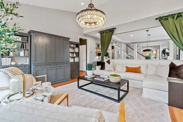 a spacious bedroom with a large bed and a window