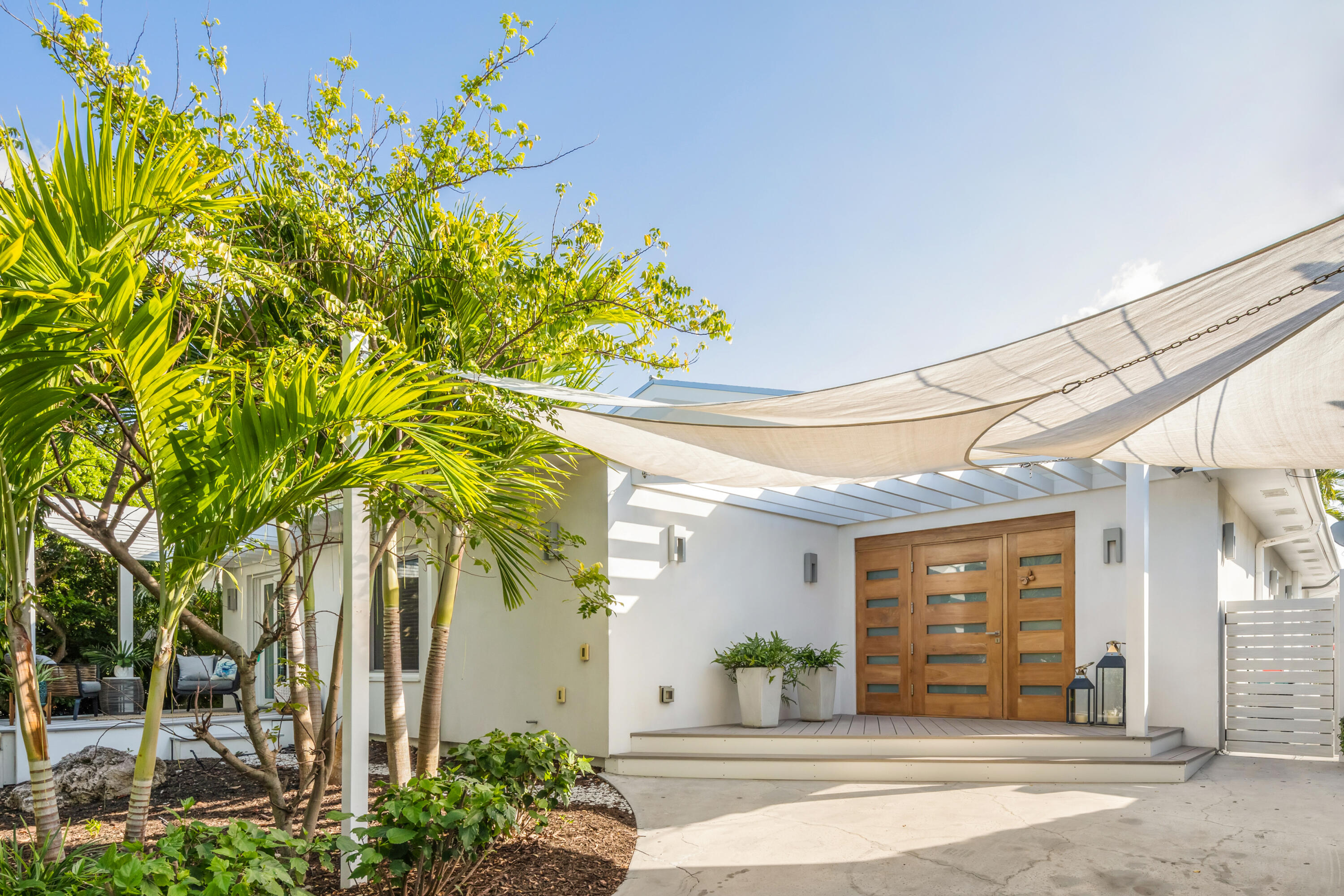 8 Coconut Drive Key West, FL 33040 - Photo 46 of 46 front view of a house with a tree