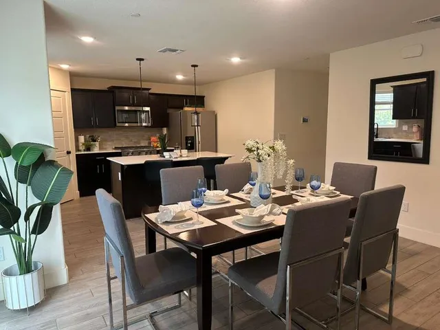 a view of a dining room with furniture