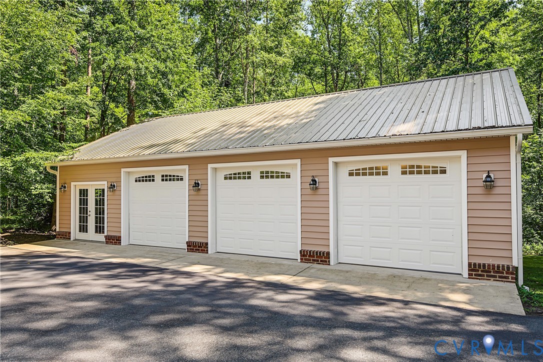 2431 Magnolia Ridge Maidens, VA 23102 - Photo 39 of 43 Detached 3-car garage has a temperature controlled