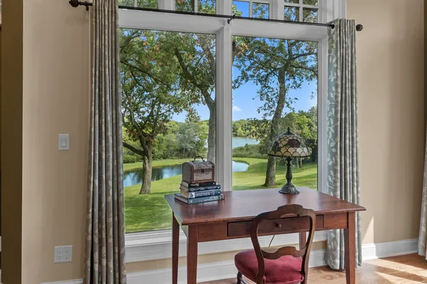 a spacious bathroom with a sink a large mirror and a bathtub
