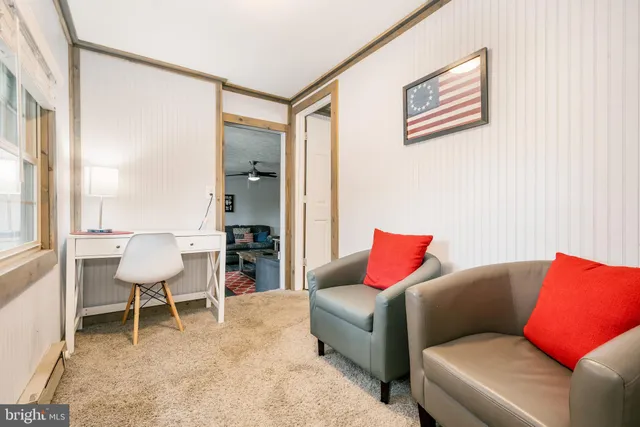 a bedroom with a bed and furniture