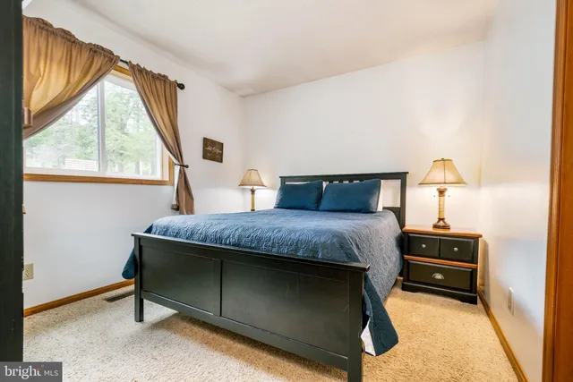 a bathroom with a sink toilet and vanity