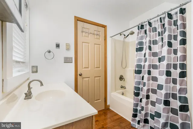 a view of a house with a yard from a balcony