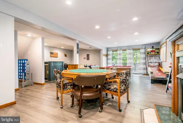 an aerial view of a house with a lake view