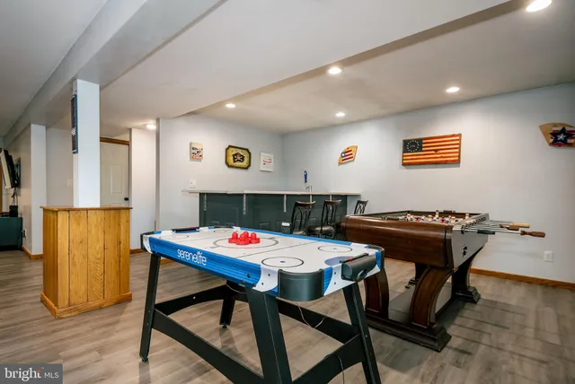 a view of a backyard with sitting area