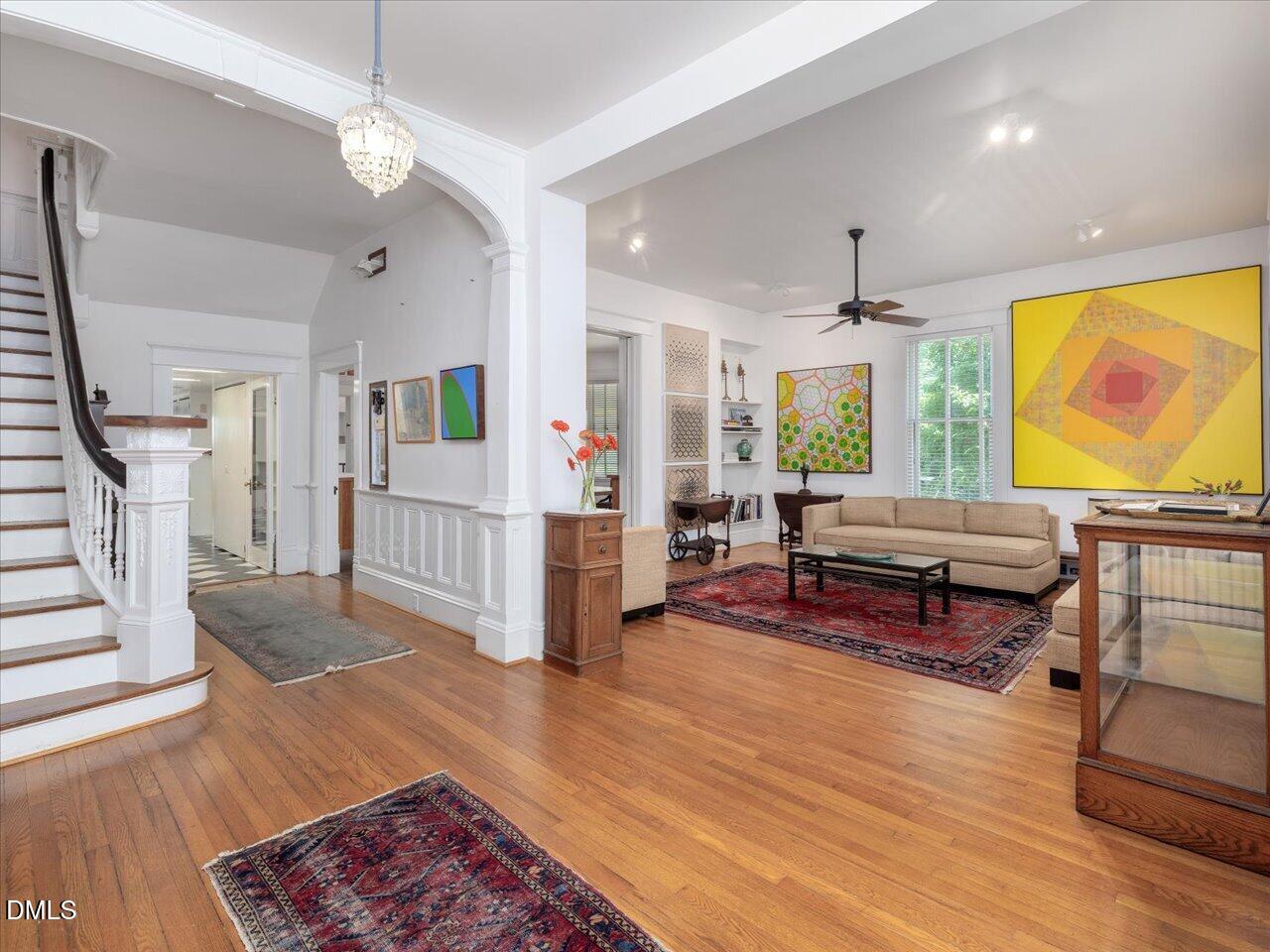 215 Hillcrest Road Raleigh, NC 27605 - Photo 26 of 97 a living room with furniture and a wooden floor