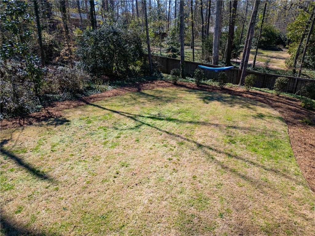 210 Riggs Drive Clemson, SC 29631 - Photo 24 of 36 This spacious yard offers ample room for outdoor activities and future landscaping designs.