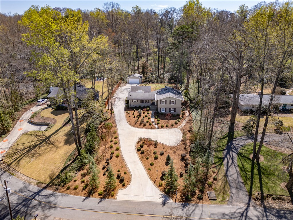 210 Riggs Drive Clemson, SC 29631 - Photo 29 of 36 This residence features a winding driveway and abundant natural landscaping.