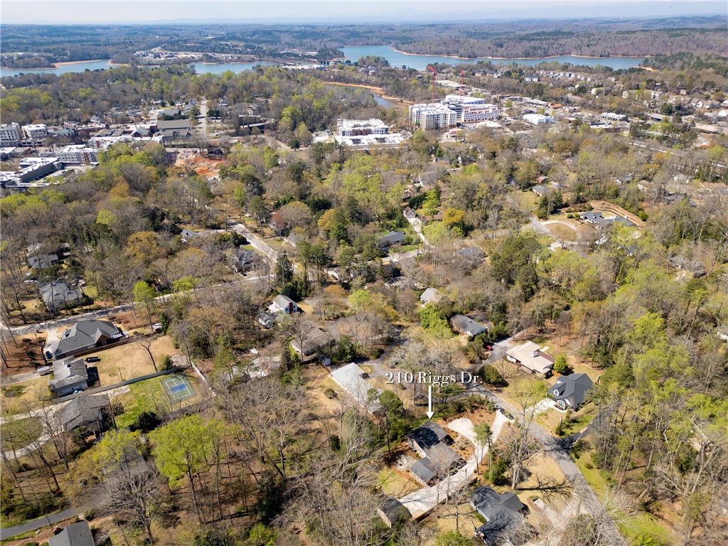 210 Riggs Drive Clemson, SC 29631 - Photo 33 of 36 This elevated view captures a serene residential landscape nestled among lush greenery, with distant water views.